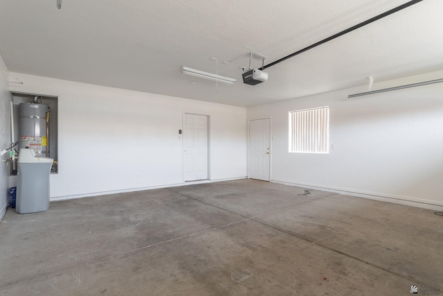 3481 W 27th Ln, Yuma, AZ 85364 - garage featuring secured water heater and a garage door opener