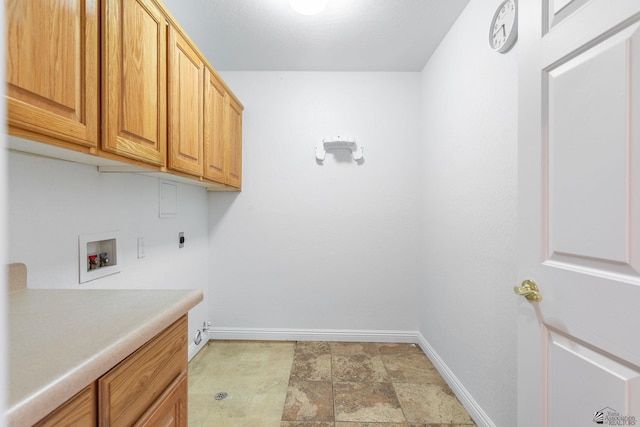 3481 W 27th Ln, Yuma, AZ 85364 - laundry area with cabinet space, baseboards, hookup for a washing machine, stone finish floors, and electric dryer hookup
