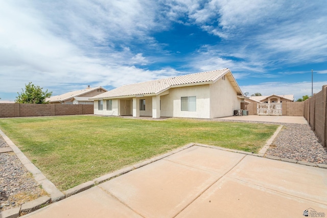 3481 W 27th Ln, Yuma, AZ 85364 - rear view of property with a tiled roof, stucco siding, and a patio