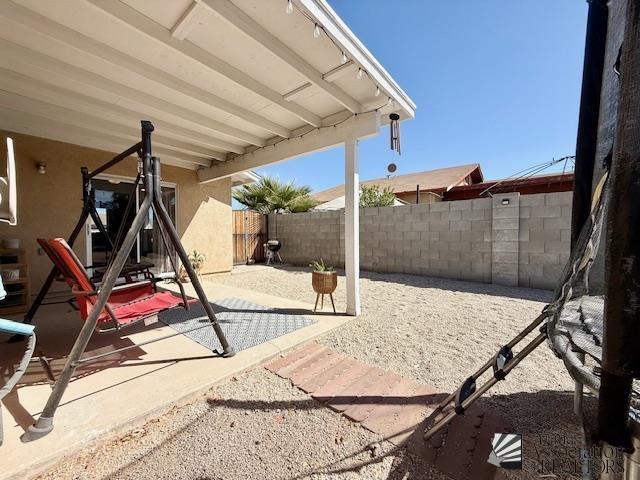 view of patio with a fenced backyard