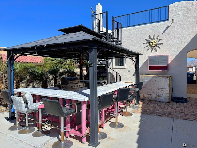 14453 E 55th St, Yuma, AZ 85367 - view of patio featuring a gazebo, grilling area, and outdoor dry bar
