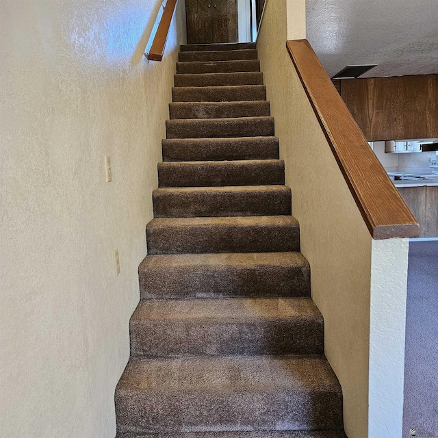2901 S Palo Verde Ln # 48, Yuma, AZ 85365 - stairway with a textured wall