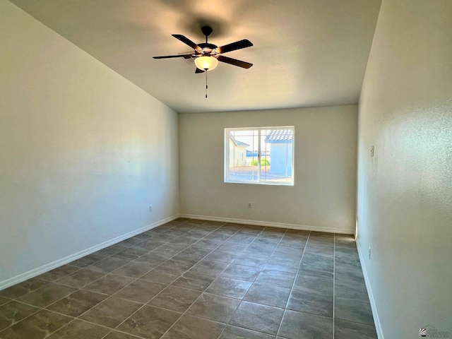 29861 E Vista Ridge Blvd, Wellton, AZ 85356 - empty room with baseboards, ceiling fan, and dark tile patterned floors