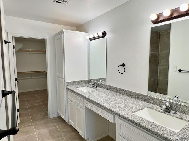 29861 E Vista Ridge Blvd, Wellton, AZ 85356 - full bathroom featuring tile patterned flooring, a sink, a walk in closet, and double vanity