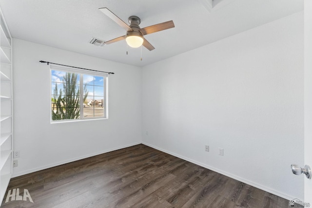 11637 E 27th St, Yuma, AZ 85367 - spare room with baseboards, a ceiling fan, dark wood-style floors, and visible vents