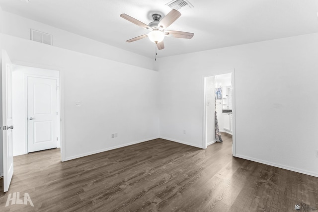 11637 E 27th St, Yuma, AZ 85367 - unfurnished room with visible vents, dark wood-type flooring, baseboards, and ceiling fan