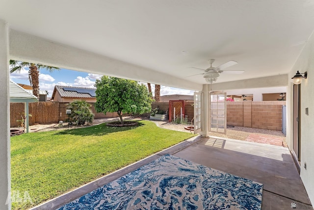 11637 E 27th St, Yuma, AZ 85367 - view of yard featuring a ceiling fan, a fenced backyard, and a patio area