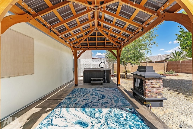 11637 E 27th St, Yuma, AZ 85367 - view of patio / terrace with a gazebo, a fenced backyard, and a hot tub
