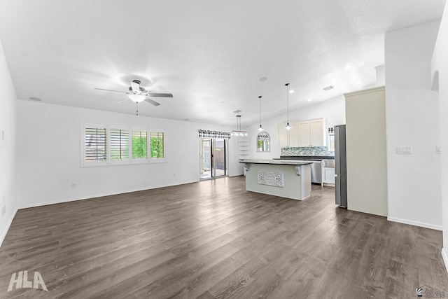 11637 E 27th St, Yuma, AZ 85367 - unfurnished living room featuring baseboards, dark wood finished floors, and ceiling fan
