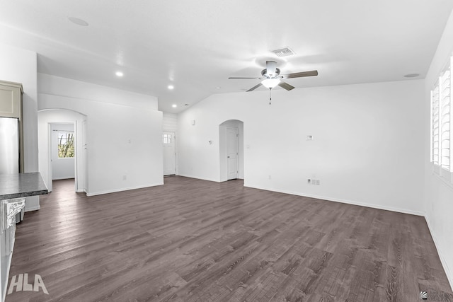 11637 E 27th St, Yuma, AZ 85367 - unfurnished living room featuring arched walkways, baseboards, a ceiling fan, and visible vents