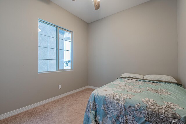 14769 E 47th Ln, Yuma, AZ 85367 - carpeted bedroom featuring baseboards and a ceiling fan