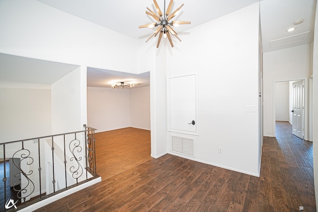 2864 W 12th Ln, Yuma, AZ 85364 - spare room featuring a chandelier and wood finished floors