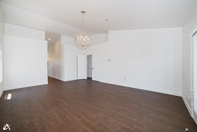 2864 W 12th Ln, Yuma, AZ 85364 - spare room with a chandelier, dark wood-type flooring, and lofted ceiling