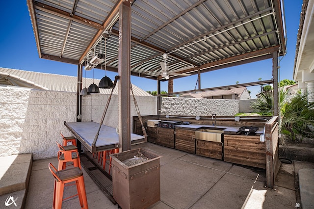 2864 W 12th Ln, Yuma, AZ 85364 - fenced backyard with area for grilling and a patio