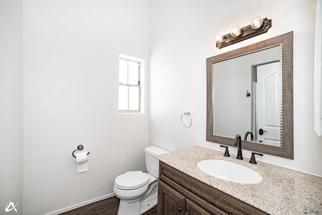 2864 W 12th Ln, Yuma, AZ 85364 - bathroom featuring vanity and wood finished floors