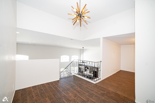 2864 W 12th Ln, Yuma, AZ 85364 - empty room featuring wood finished floors, a chandelier, and recessed lighting