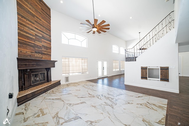 2864 W 12th Ln, Yuma, AZ 85364 - unfurnished living room featuring high vaulted ceiling, a ceiling fan, a fireplace, recessed lighting, and stairway