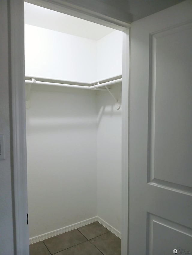 walk in closet featuring tile patterned floors
