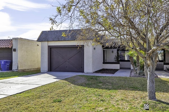 417 W 37th St, Yuma, AZ 85365 - view of front of house featuring stucco siding, concrete driveway, an attached garage, and a front lawn