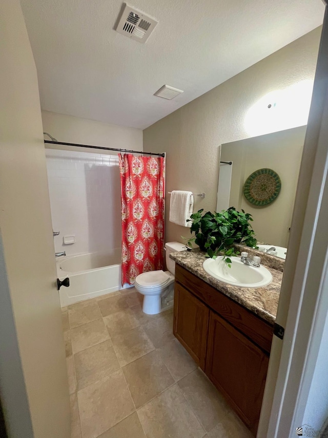 full bath with vanity, shower / bath combo with shower curtain, toilet, and visible vents