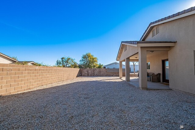 10642 E 35th Pl, Yuma, AZ 85365 - view of yard with a fenced backyard and a patio area