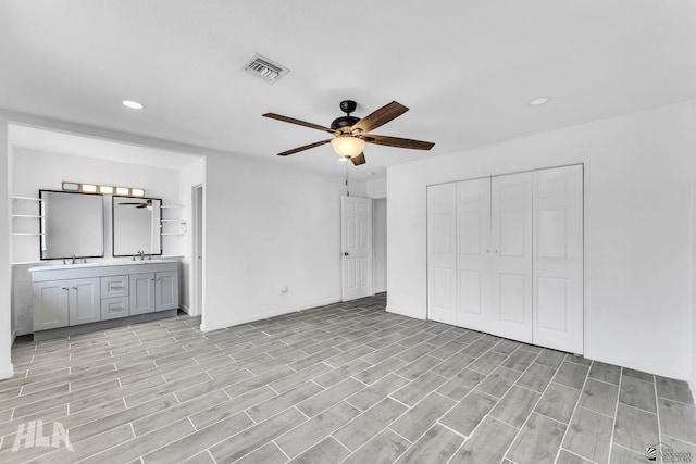 1721 S Athens Ave, Yuma, AZ 85364 - unfurnished bedroom with recessed lighting, light wood finished floors, baseboards, a closet, and ceiling fan
