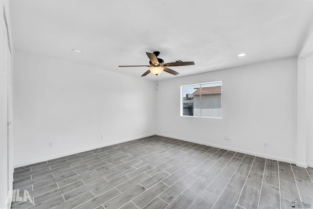 1721 S Athens Ave, Yuma, AZ 85364 - spare room with ceiling fan, recessed lighting, baseboards, and wood finished floors