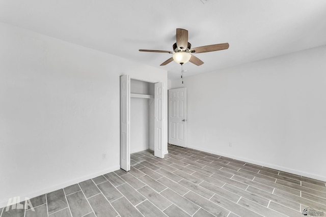 1721 S Athens Ave, Yuma, AZ 85364 - unfurnished bedroom featuring a closet, ceiling fan, wood finished floors, and baseboards