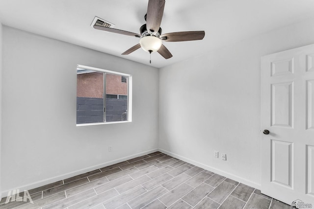 1721 S Athens Ave, Yuma, AZ 85364 - empty room with a ceiling fan, baseboards, and wood finished floors