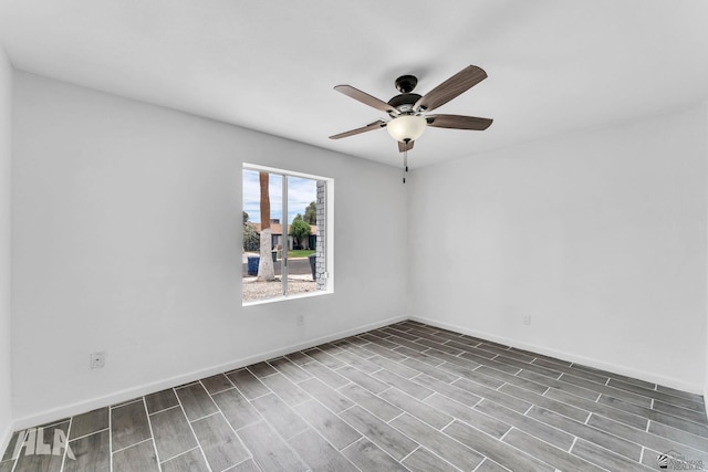 1721 S Athens Ave, Yuma, AZ 85364 - unfurnished room with a ceiling fan, wood finished floors, and baseboards