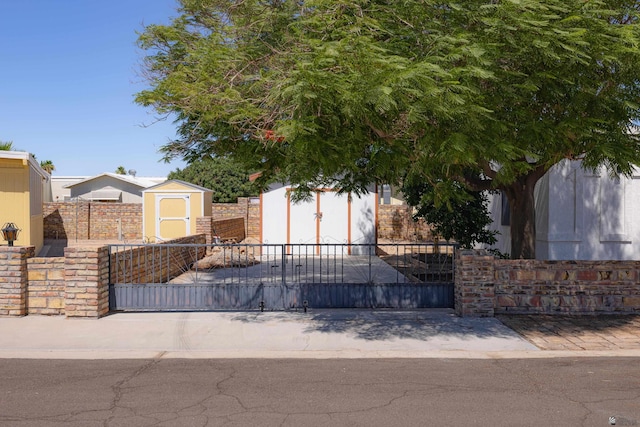 13239 E 47th Dr, Yuma, AZ 85367 - view of front of property featuring a storage shed and stucco siding