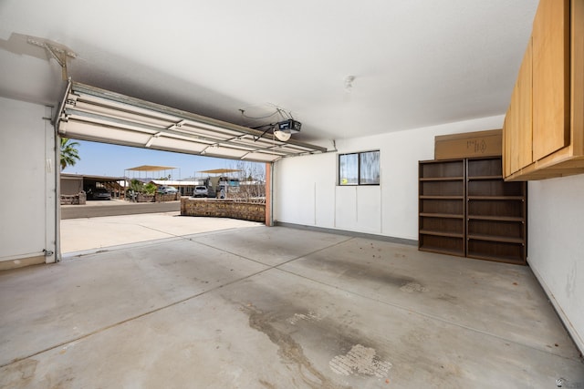 13239 E 47th Dr, Yuma, AZ 85367 - garage featuring a garage door opener and baseboards