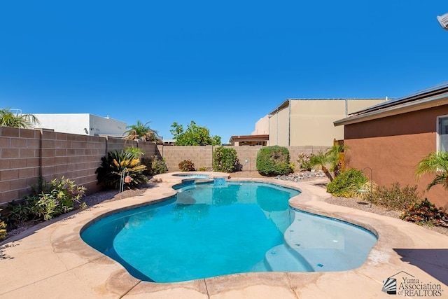 11861 E Eclipse Ct, Yuma, AZ 85367 - view of pool with a pool with connected hot tub and a fenced backyard
