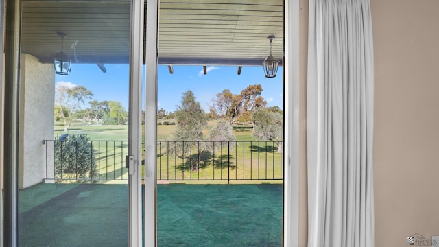 1440 E Laguna Pl, Yuma, AZ 85365 - doorway with carpet flooring and golf course view
