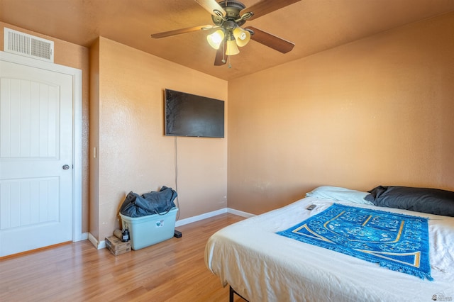 2931 W 20th St, Yuma, AZ 85364 - bedroom with light wood finished floors, baseboards, and a ceiling fan
