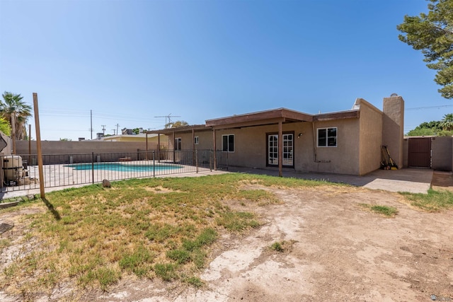 2931 W 20th St, Yuma, AZ 85364 - view of swimming pool with french doors and a patio