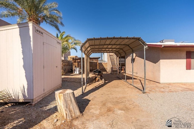 13125 E 51st Ln, Yuma, AZ 85367 - view of yard featuring a storage unit and an outdoor structure