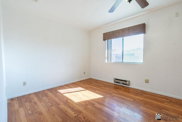 13125 E 51st Ln, Yuma, AZ 85367 - spare room with baseboards, ceiling fan, and wood finished floors
