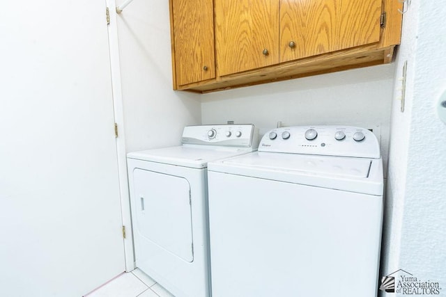 13125 E 51st Ln, Yuma, AZ 85367 - washroom featuring separate washer and dryer and cabinet space