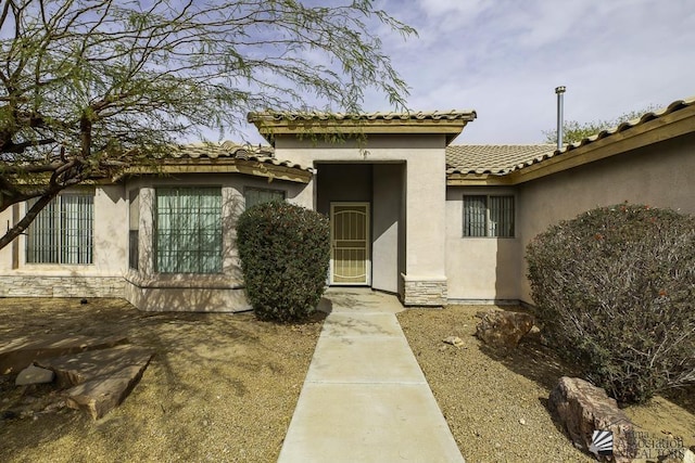 11760 E 28th Pl, Yuma, AZ 85367 - property entrance featuring stucco siding and a tile roof