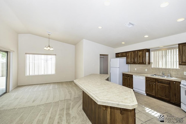 11760 E 28th Pl, Yuma, AZ 85367 - kitchen with white appliances, visible vents, a sink, and light countertops