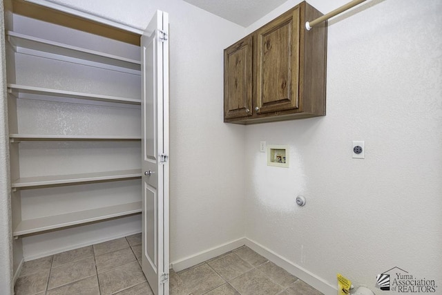 11760 E 28th Pl, Yuma, AZ 85367 - laundry room featuring hookup for an electric dryer, hookup for a gas dryer, cabinet space, baseboards, and hookup for a washing machine