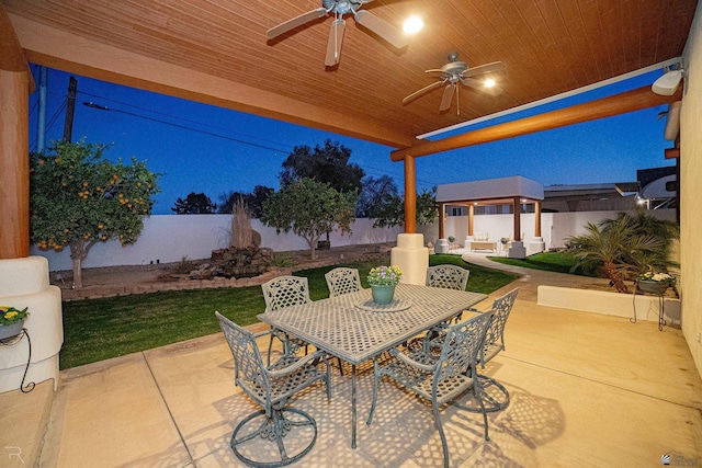 1009 S Tamarack Ave, Yuma, AZ 85364 - view of patio / terrace featuring outdoor dining area, a fenced backyard, a ceiling fan, and a gazebo