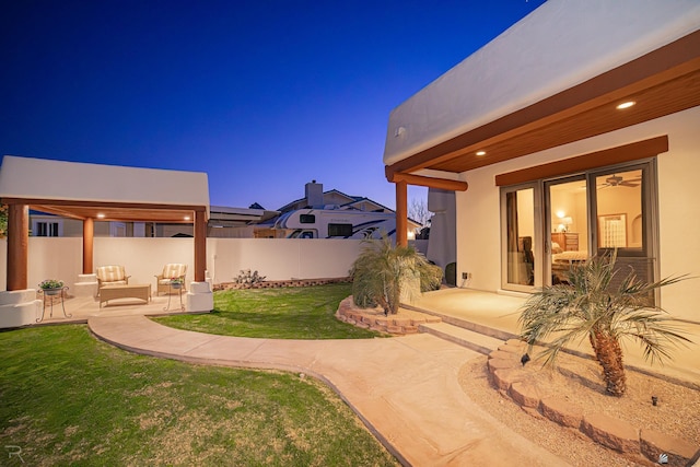 1009 S Tamarack Ave, Yuma, AZ 85364 - view of yard featuring fence, an outdoor living space, and a patio area