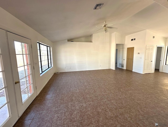 unfurnished room featuring visible vents, a ceiling fan, baseboards, and high vaulted ceiling