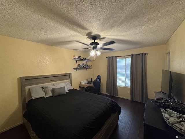 6348 E 45th St, Yuma, AZ 85365 - bedroom featuring dark wood-style flooring, a ceiling fan, and a textured ceiling