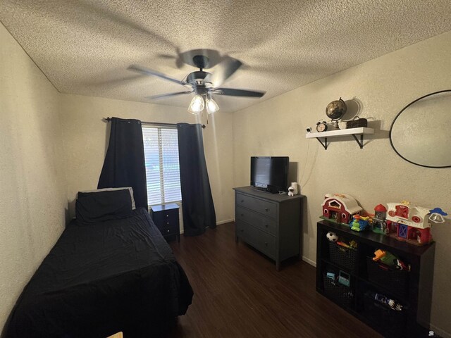 6348 E 45th St, Yuma, AZ 85365 - bedroom featuring wood finished floors, a textured ceiling, a textured wall, and ceiling fan