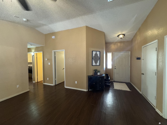 6348 E 45th St, Yuma, AZ 85365 - entrance foyer with lofted ceiling, wood finished floors, baseboards, and a textured ceiling