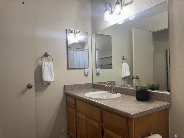 6348 E 45th St, Yuma, AZ 85365 - bathroom with vanity and a textured wall