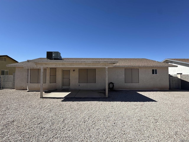 6348 E 45th St, Yuma, AZ 85365 - back of house featuring central AC, a patio, and stucco siding
